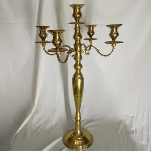 A five-arm gold candelabra