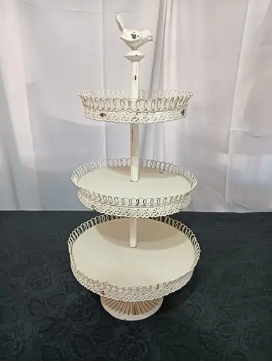 A white three-tier cake stand