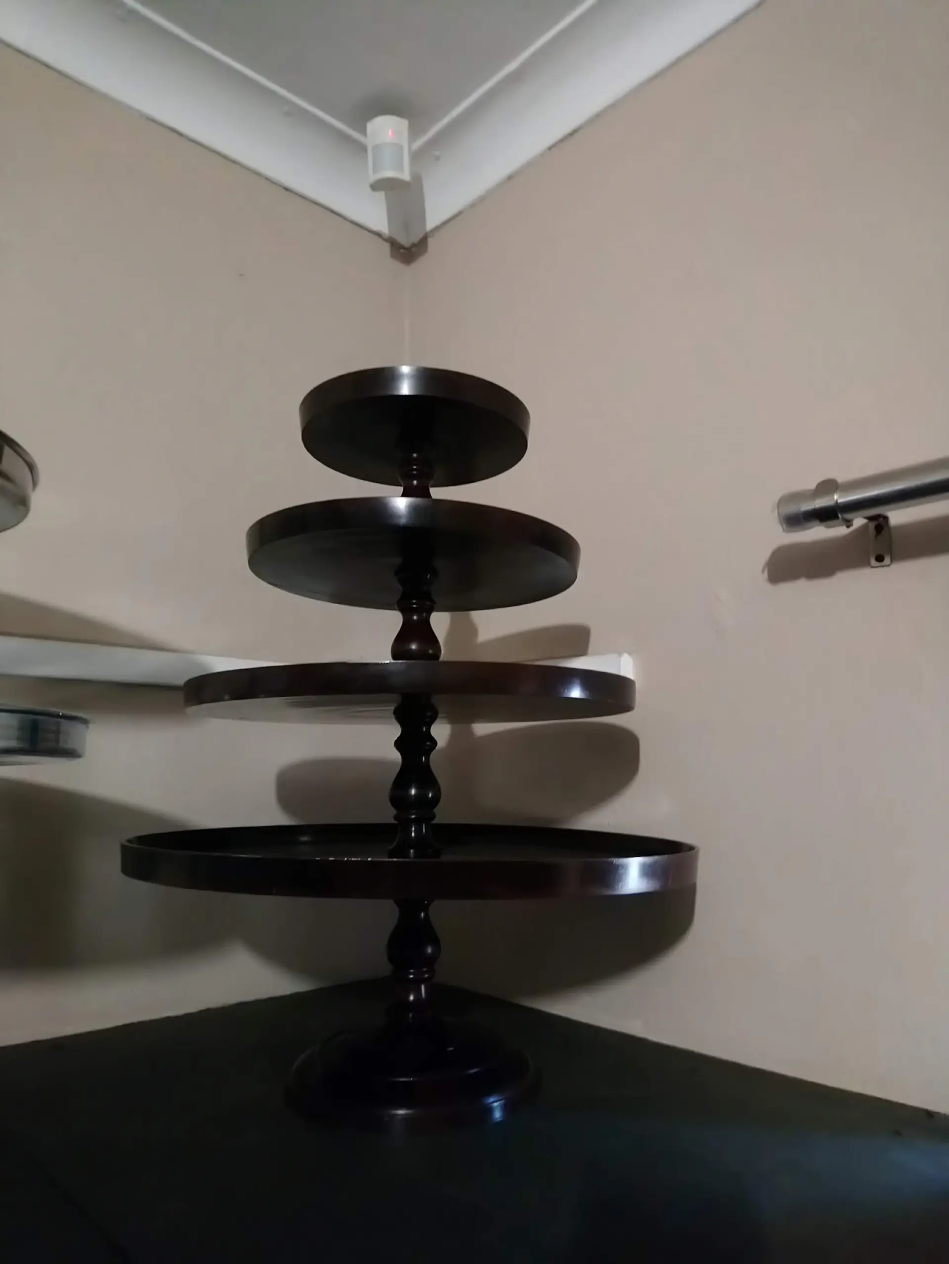 A black tiered stand