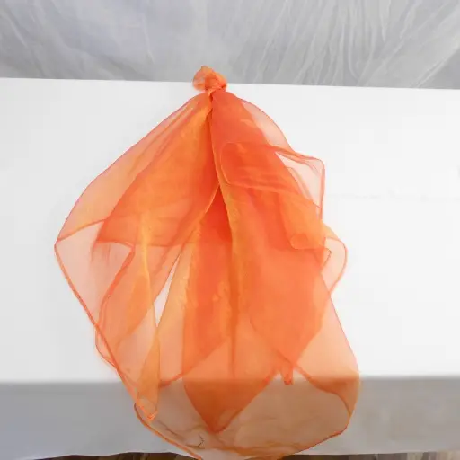 An orange organza overlay